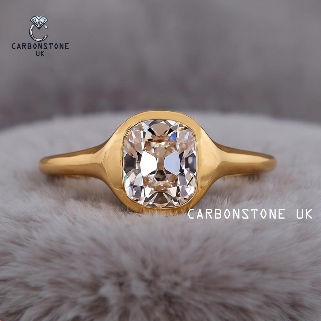 Bezel Cushion Cut Engagement Ring in Platinum