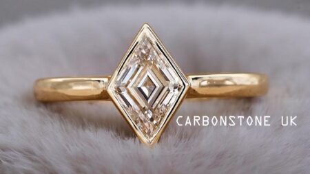 Bezel Lozenge Cut Engagement Ring in Yellow Gold