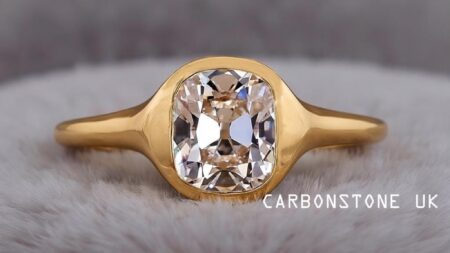 Bezel Cushion Cut Engagement Ring in Platinum