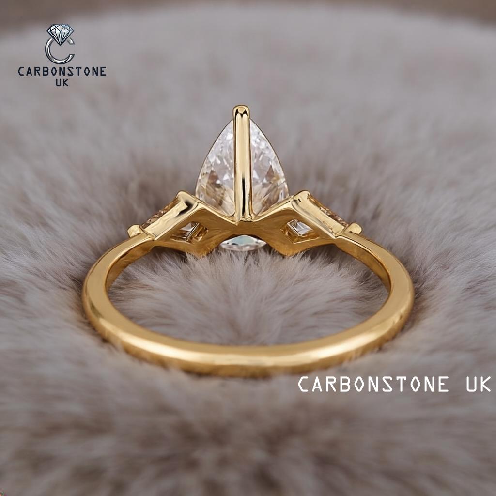 Pear Cut Engagement Ring in Yellow Gold