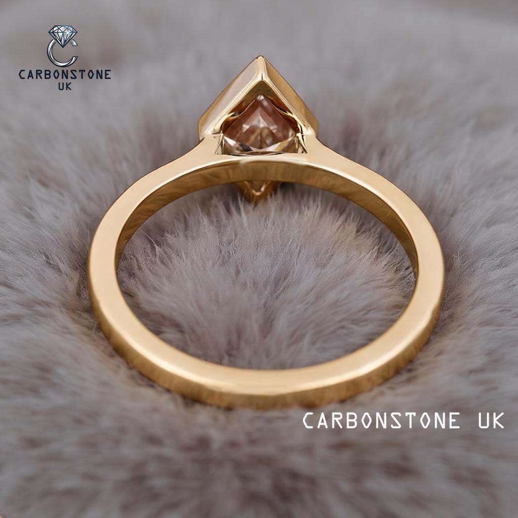 Bezel Lozenge Cut Engagement Ring in Yellow Gold